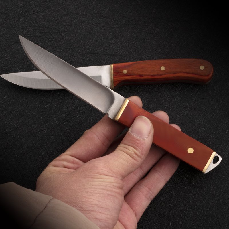 Heavy hands and a meat knife and a new meat knife