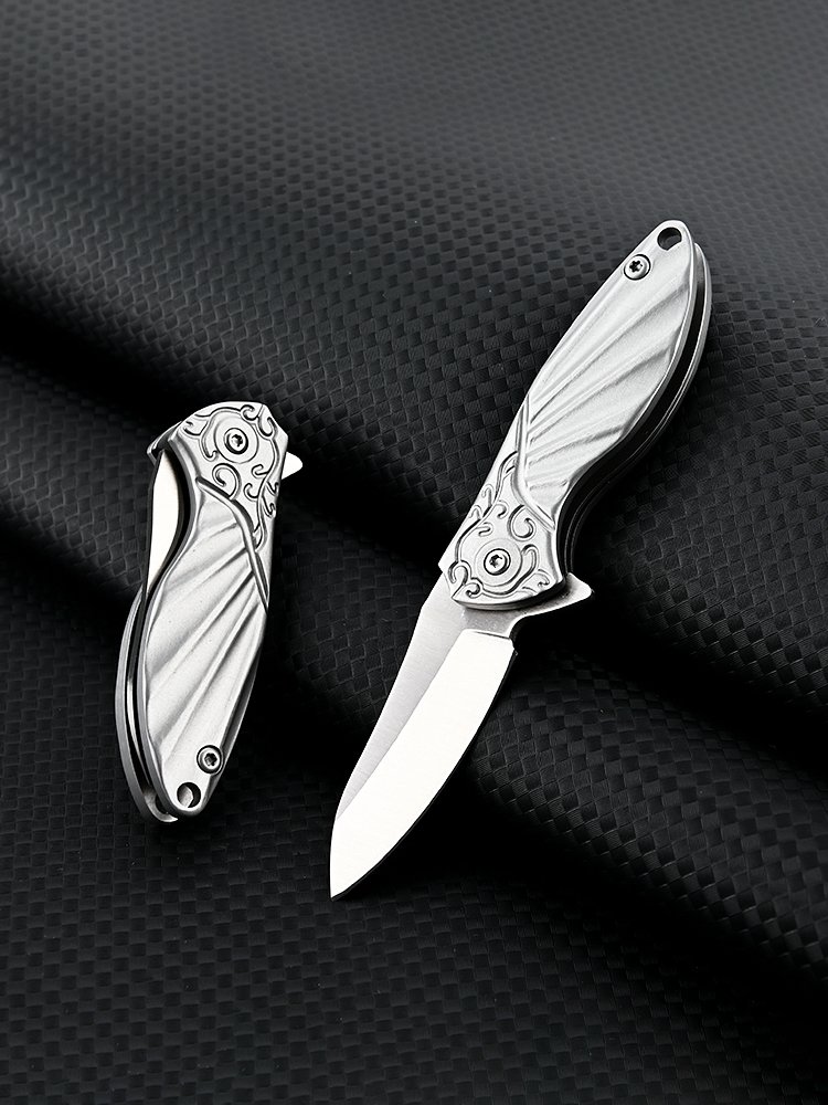 Open the stainless steel knife and fold the fruit knife in the open