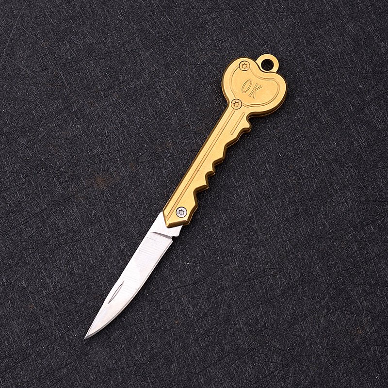 A key knife with a portable knife for protection, folding a knife and a rusty steel fruit knife for camping