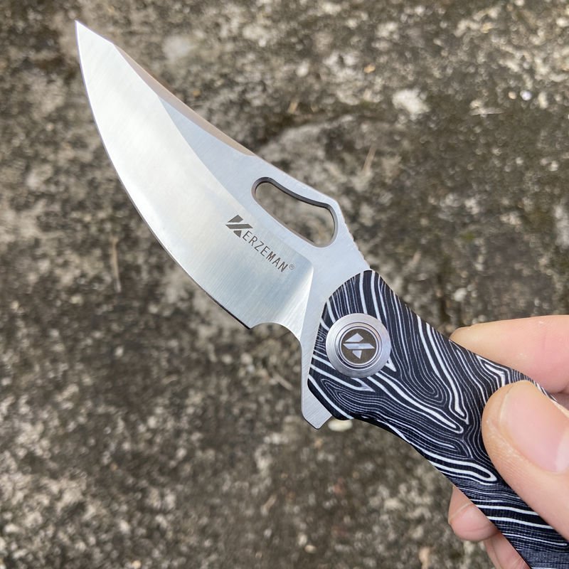 THE HIGH-END CNC DEEP-PROCESSED DC53 FIELD CAMPER WITH A SHARP DOUBLE-COLOURED G10 HANDLE