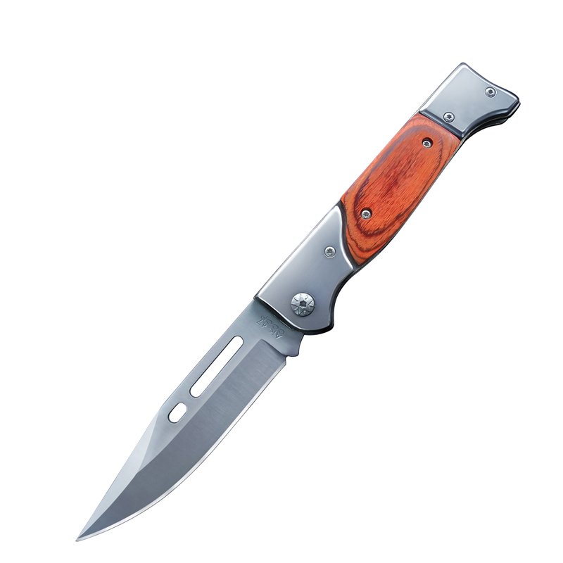 A small knife on the outside and a guacamole on the field, and a sharp folding of the knife, a bag of fruit and a field knife