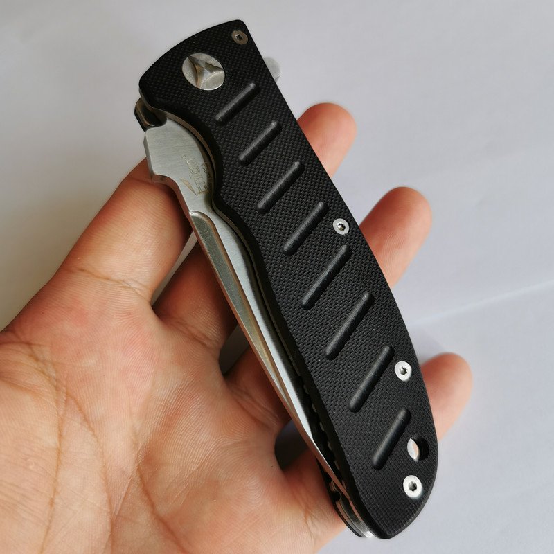 A new version of enlan's real EL01, accompanied by an outdoor folding of a sharp fruit knife, Em01 camp defense tool