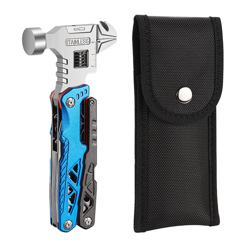An outdoor multi-purpose wrench hammer and a folding knife saw a field camper with a broken window and an emergency combination tool