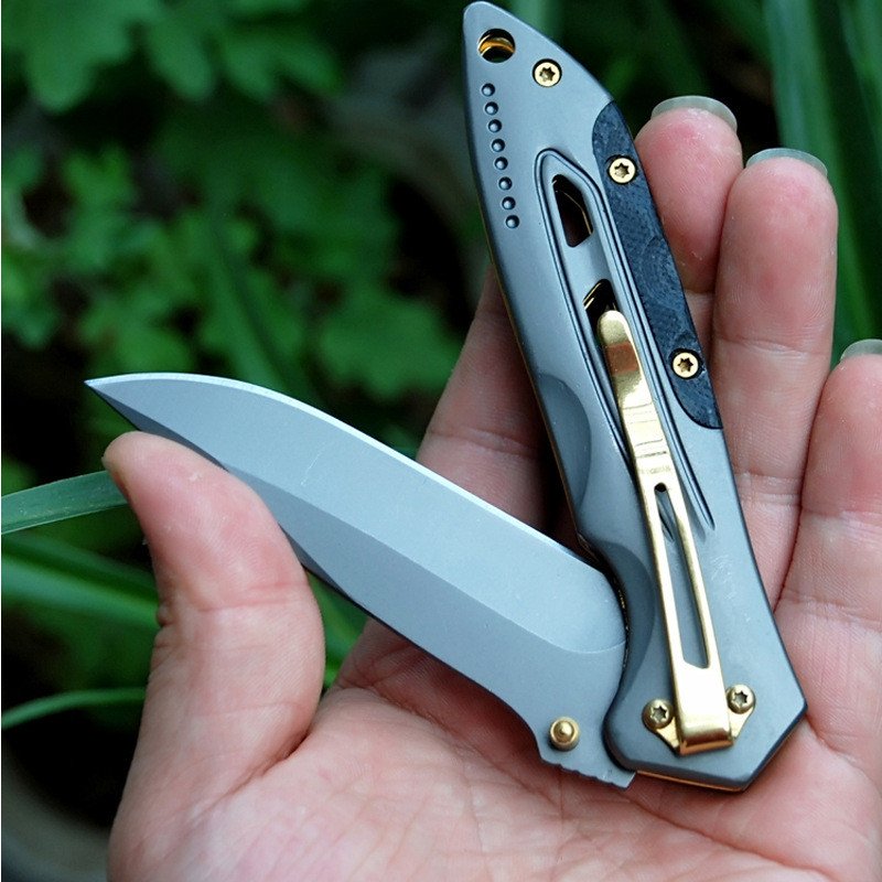 A special army camper with an open-edged blade and a small knife