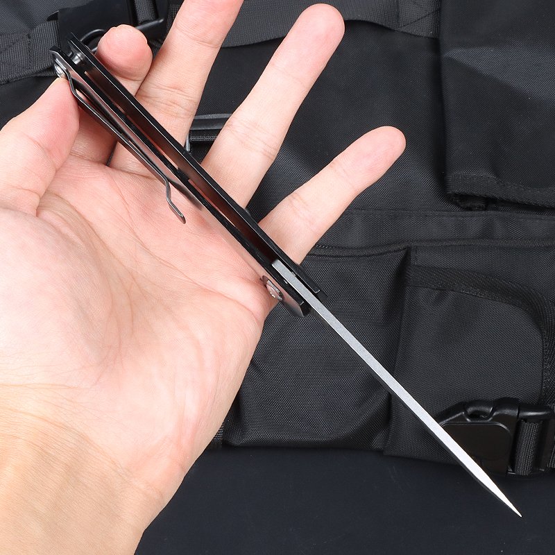 A FULL STEEL FOLDING KNIFE, AN OUTSIDE FOLDING KNIFE, A CNC HIGH-HARD EDGE KNIFE WITH A FIELD SURVIVAL KNIFE