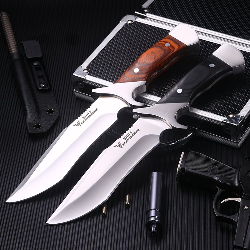 Outside the house, with a small knife, a high-strength camper, a sharp blade, a straight knife
