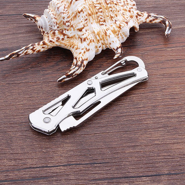 An open-air stainless steel folding knife, a mini-key knife, a field knife and a fruit knife