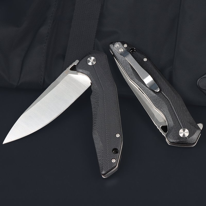 A D2 STEEL KNIFE, A MULTI-PURPOSE FOLDER, A HIGH-STRENGTH, CAMPING KNIFE, AND A MOUNTAIN CAMPER