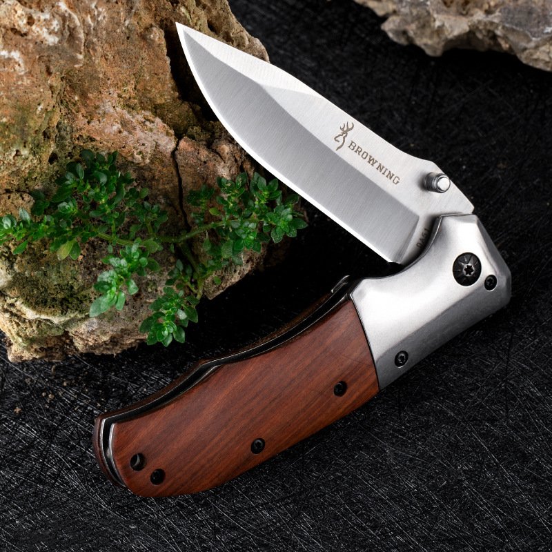 "BRONNING" "DA51" WITH A FRUIT KNIFE AND A ROAST KNIFE IN THE FIELD