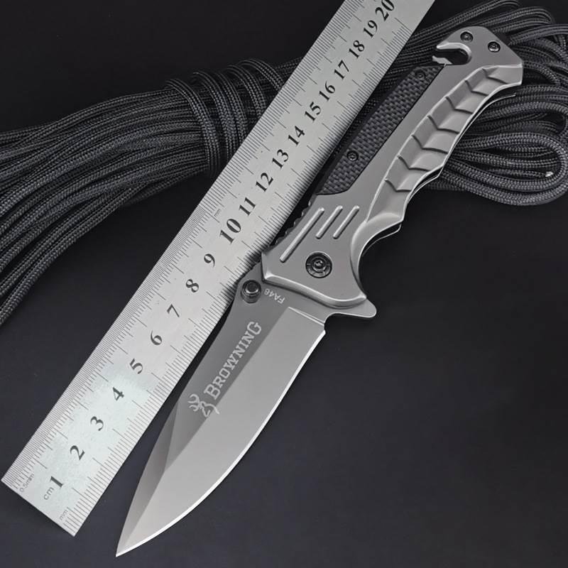 A small knife outside of the house, a high-hard folding knife, a multi-purpose camper barbecue, and a fruit knife