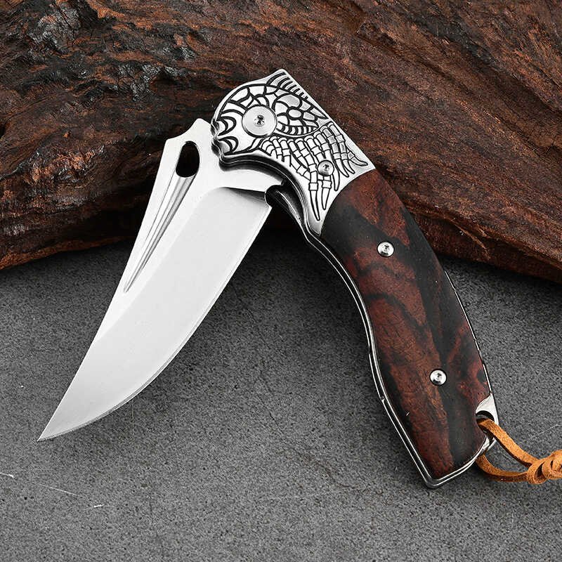An outdoor folding knife and a home camping fruit knife with a sharp-fishing blade