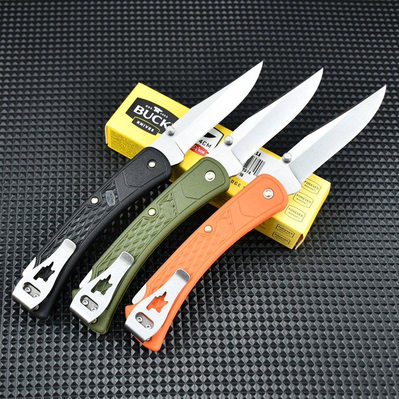 New Buck's field camping with a folding knife, and he's got a knife that's very hard to use