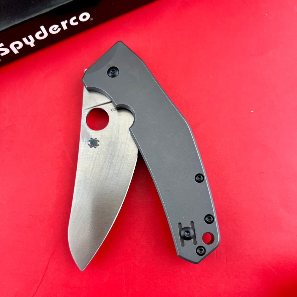 C211 TITANIUM ALLOY FOLDING KNIFE, AND THE FIELD CAMP CARRIES A FRUIT KNIFE WITH A SHARP SNAG