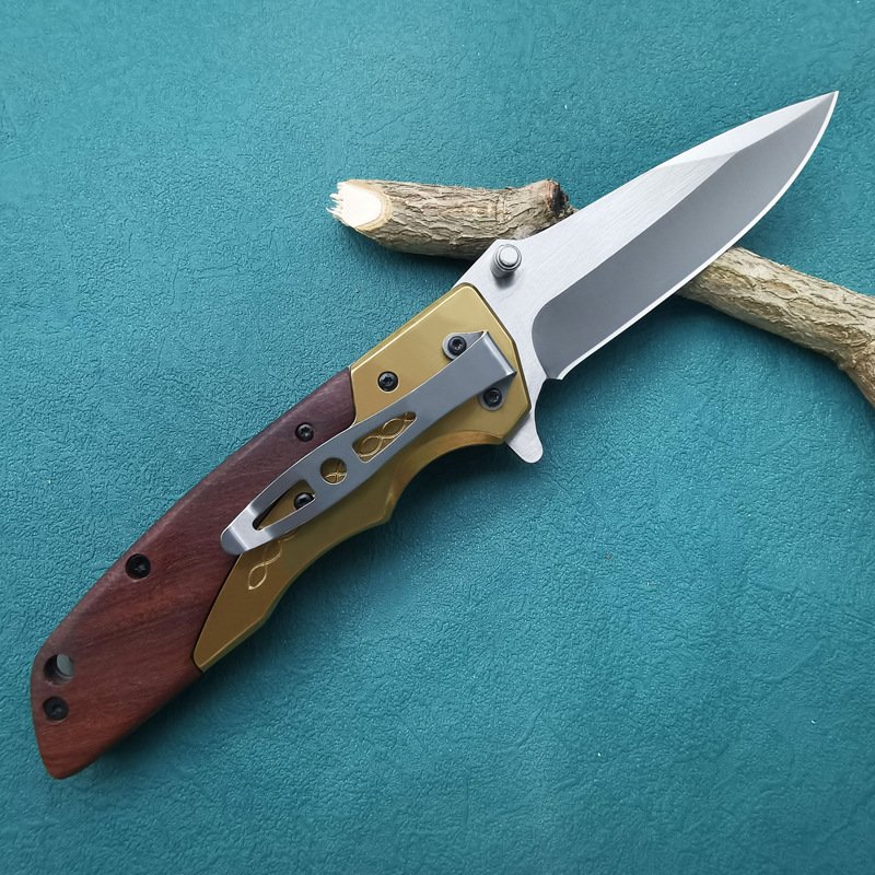 An outdoor camping knife with a cold weapon and a field life knife
