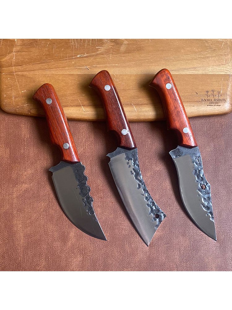 Inner Mongol hands with a cleaver and a fruit knife with a sharp, hard-to-exercise camper