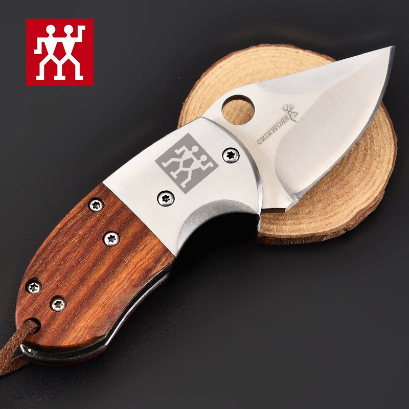 The German double tails folded the knife with the knife and the mini-carved delivery knife