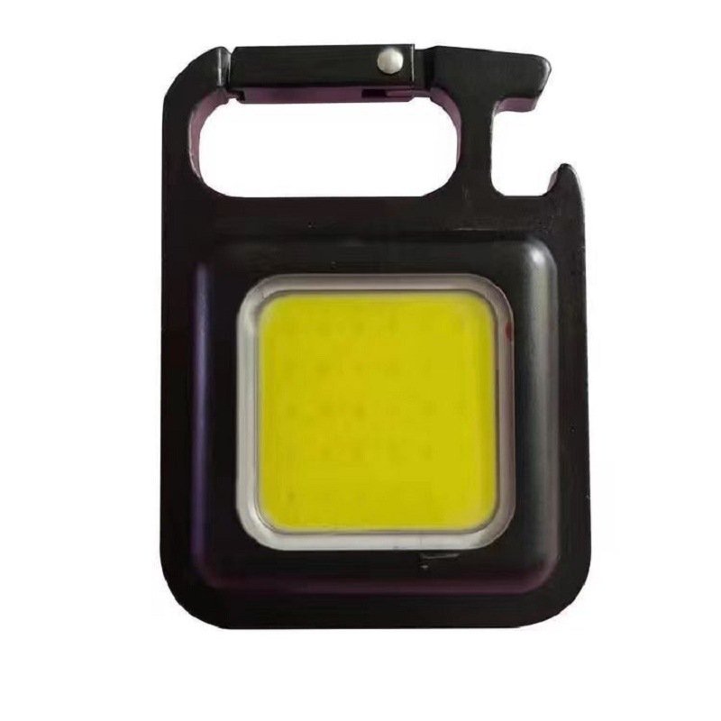 Camping equipment with a multifunctional emergency light key to a tent in an outdoor camp to charge a small flashlight