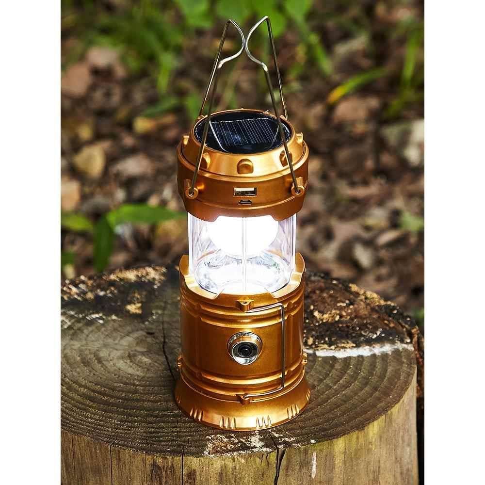 Solar outdoor camping lights are extended to recharging wild old hand-held tents with household lighting