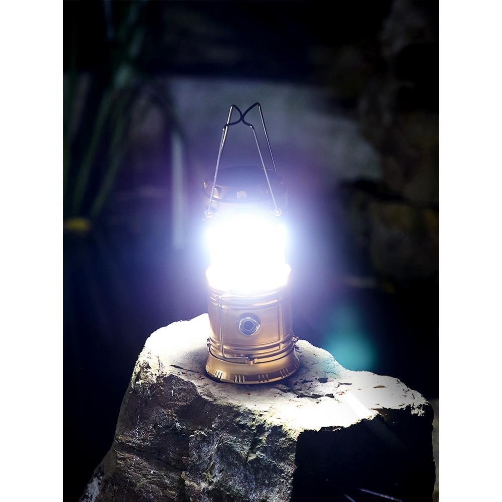 Solar outdoor camping lights are extended to recharging wild old hand-held tents with household lighting