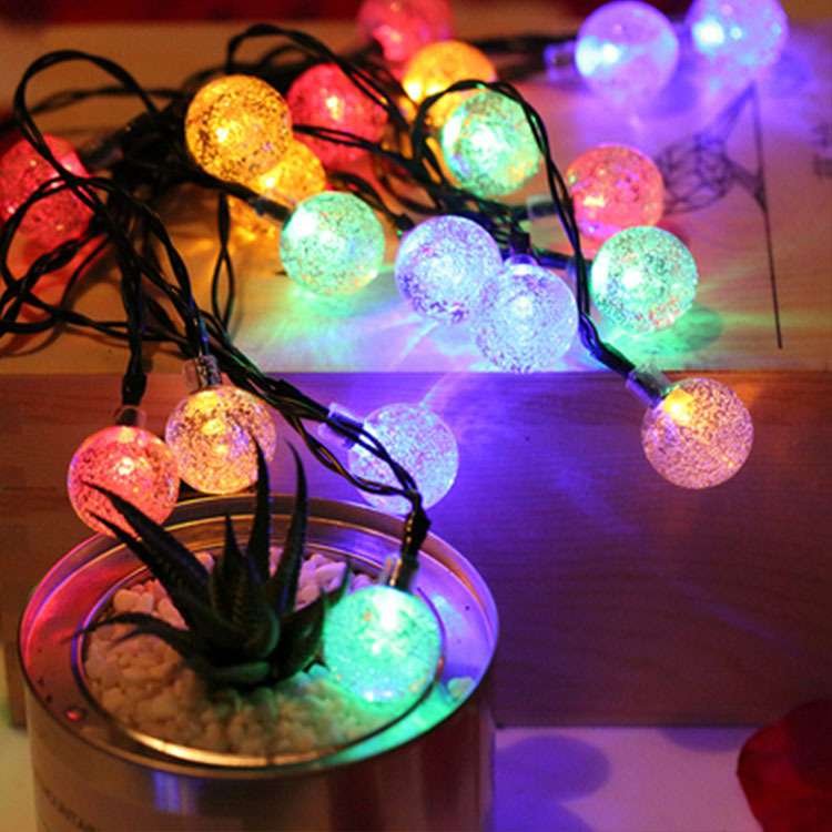 LED SOLAR OUTDOOR LIGHTS IN THE COURTYARD USED A BUBBLE LIGHT TO TIE UP THE AIR-PROOF CAMPING TENT WITH A COLORED LIGHT.