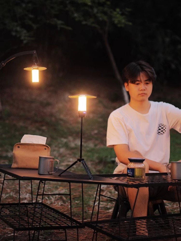 An outdoor light camping lamp carries an ultra-extreme airlight emergency charger to the camping tent sky