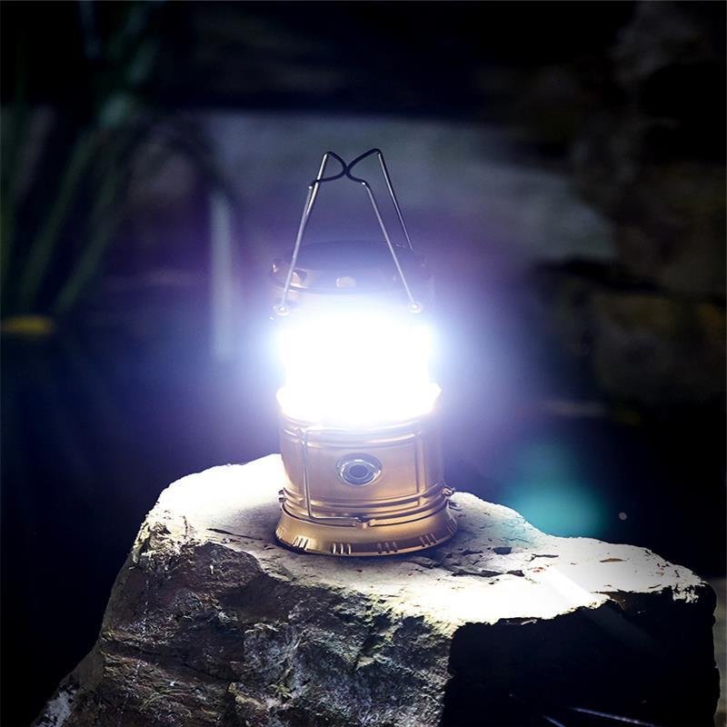Solar outdoor camping lights are extended to recharging wild old hand-held tents with household lighting