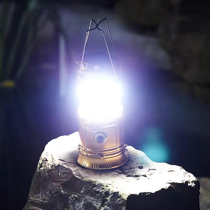 Solar outdoor camping lights are extended to recharging wild old hand-held tents with household lighting