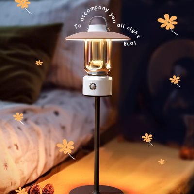 An outdoor lighting camping light is charged to a multi-purpose field retrospect light on the roof of a horse tent