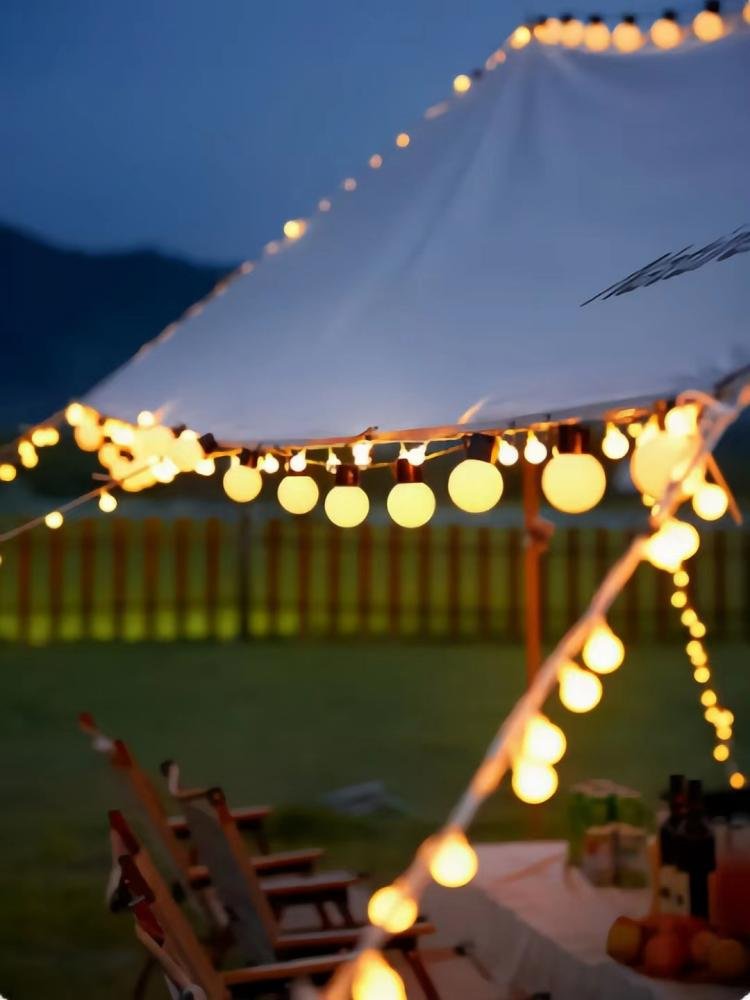 the outdoor camping light atmosphere, the roofing of the tent, the long-term led light camp