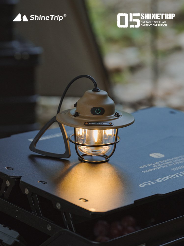 The camping light on the pine nuts tent in a fun outdoors