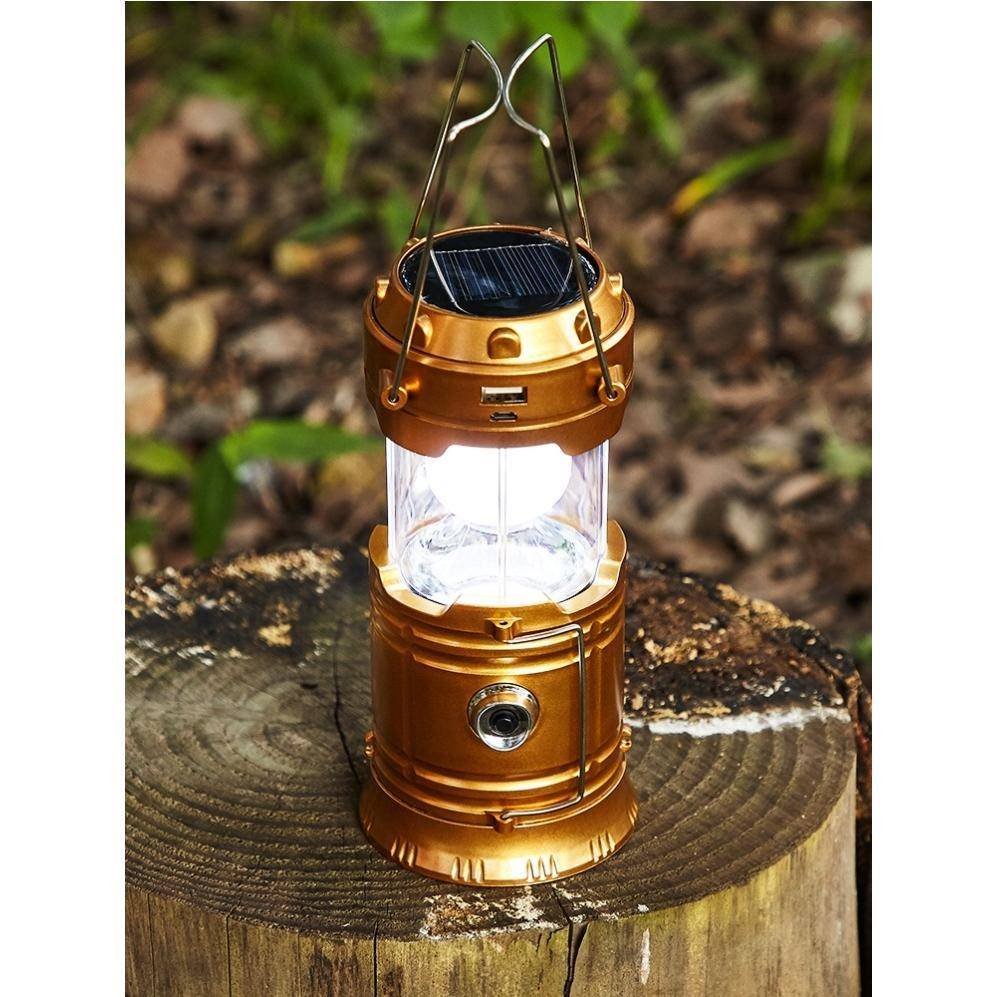 Solar outdoor camping lights are extended to recharging wild old hand-held tents with household lighting