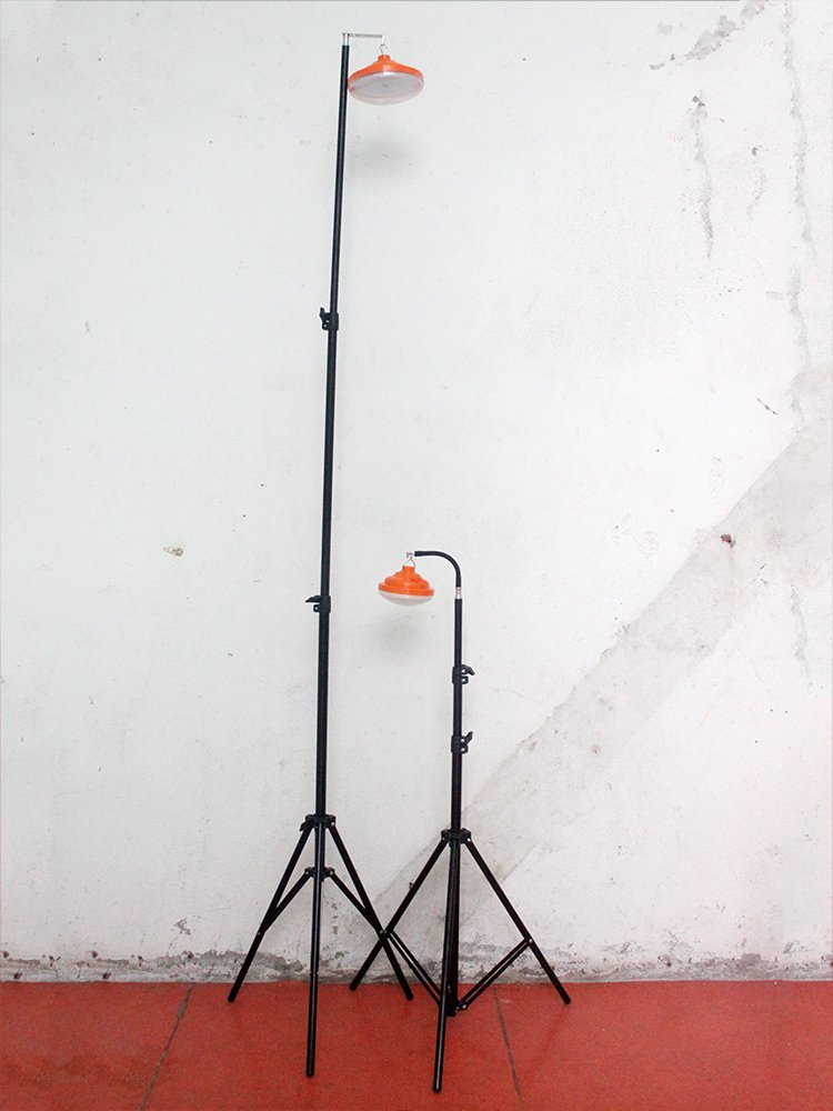 Three tripods dedicated to the outdoor lighting stand in the night stand