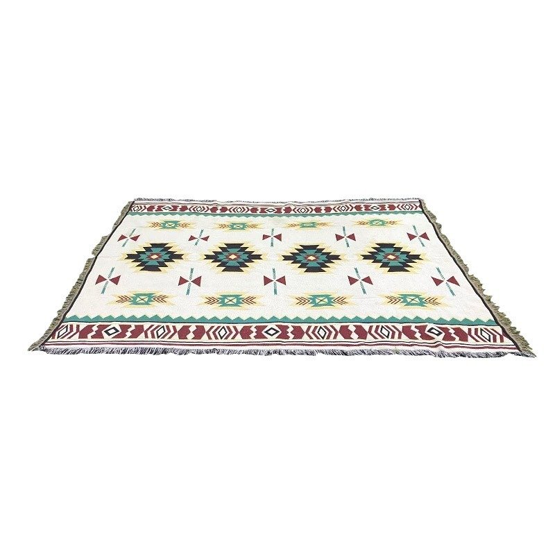 A camping blanket for the outdoor picnic table with a camping blanket for the Bohemia tent