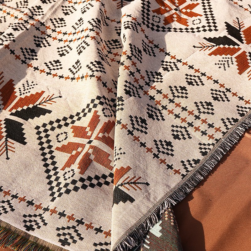 blan for the picnic pad with a thick bohemia tarpaulin and a camping blanket