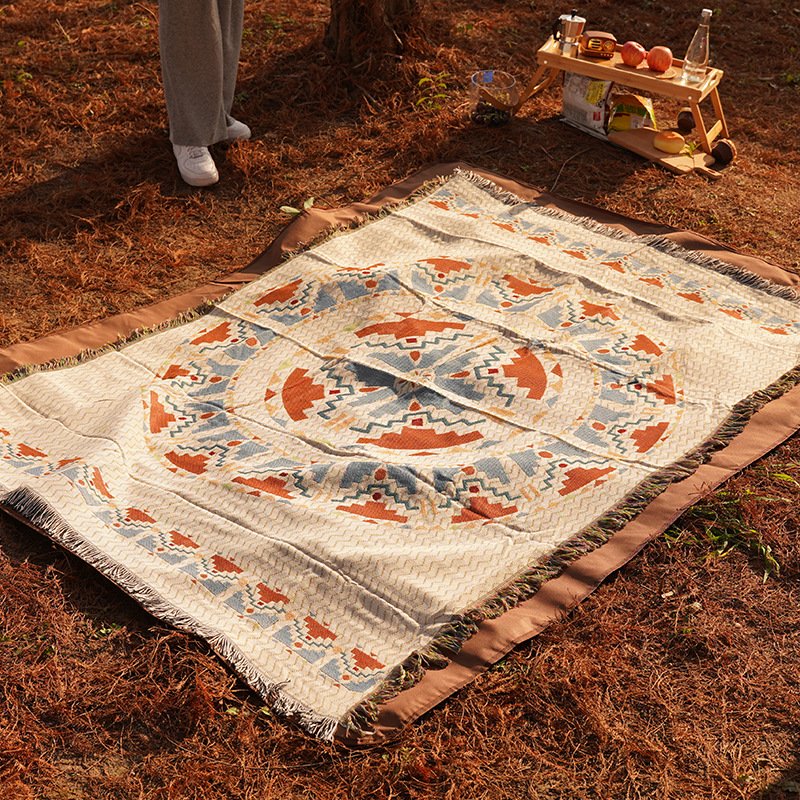 blan for the picnic pad with a thick bohemia tarpaulin and a camping blanket