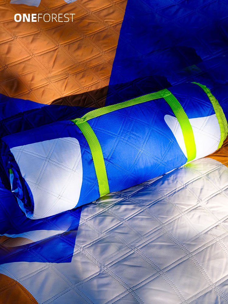 ONEFOREST, A PICNIC PAD WITH A THICK OUTDOOR CAMP PAD ON THE LAWN