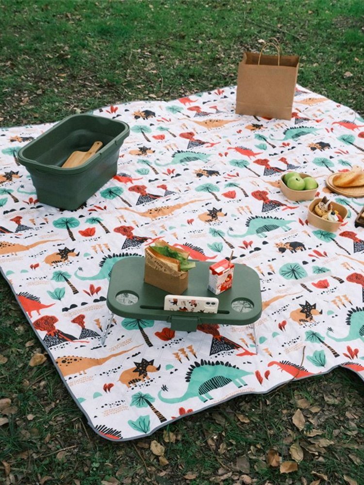 A picnic mat with a thick tent and a field camping mat for a picnic and a spring picnic