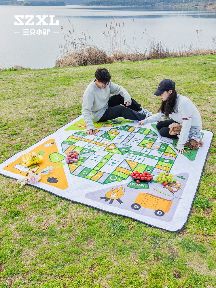 Three little donkey picnic pads with a thick spring lawn camping tent on the beach, and a cooking pad