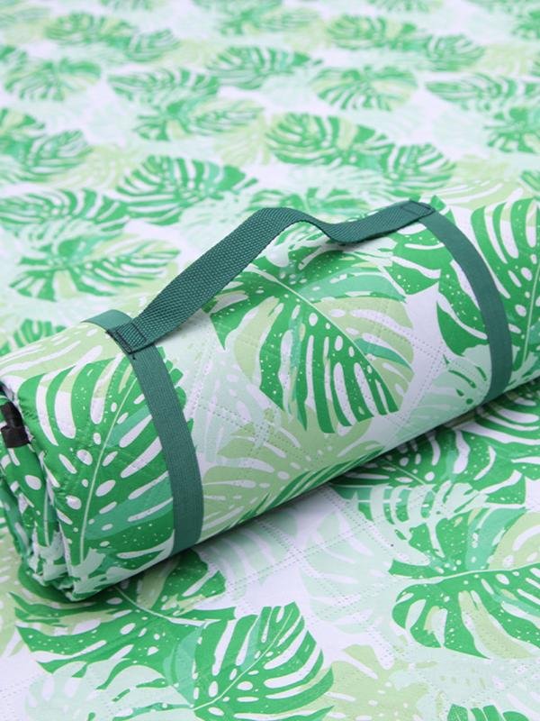 A picnic mat with an outdoor tent with a mattress in the lawn park and a watercooking pad thicken
