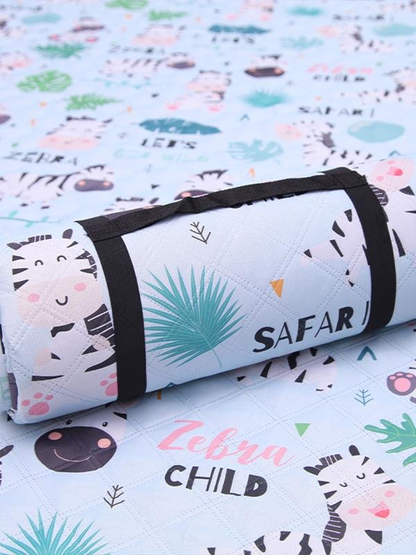 A picnic mat with an outdoor tent with a mattress in the lawn park and a watercooking pad thicken