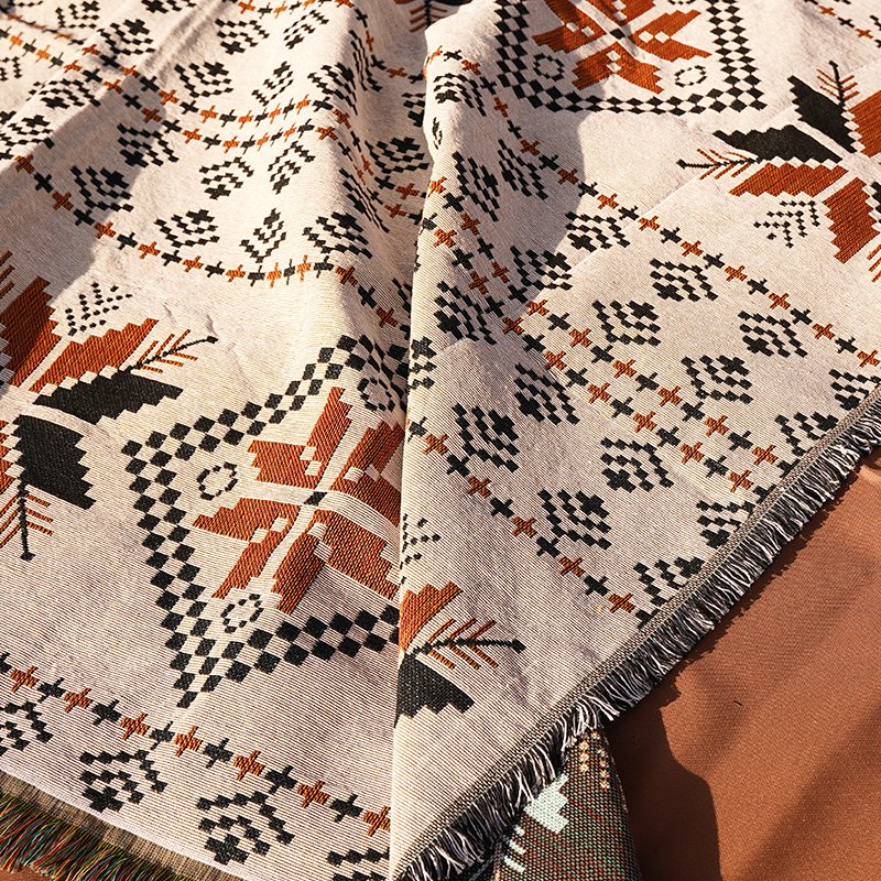 A picnic mat with a thick Bohemia mat and an outdoor camping blanket tablecloth