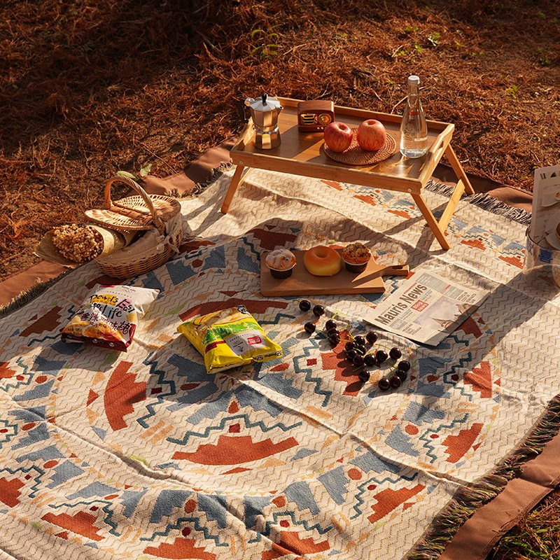 A picnic mat with a thick Bohemia mat and an outdoor camping blanket
