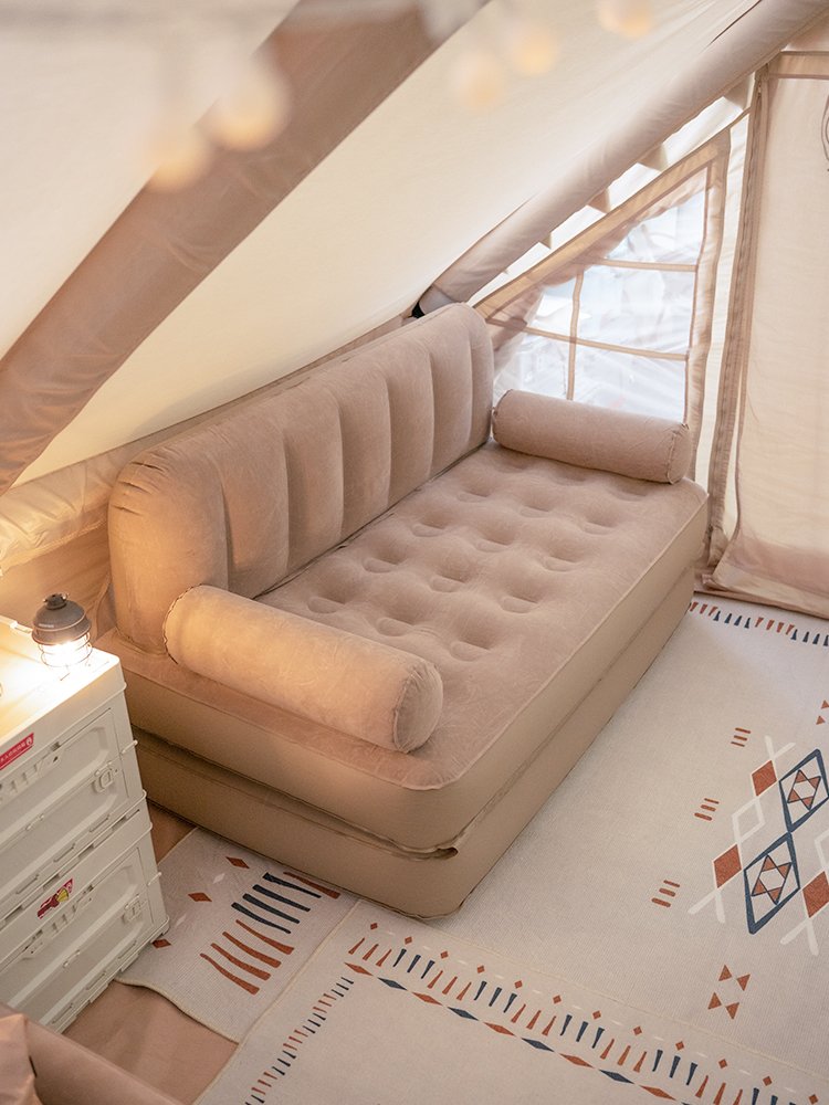 an outdoor inflatable mattress with a tent and camping couch couch and a pedigree with an impulsive mattress