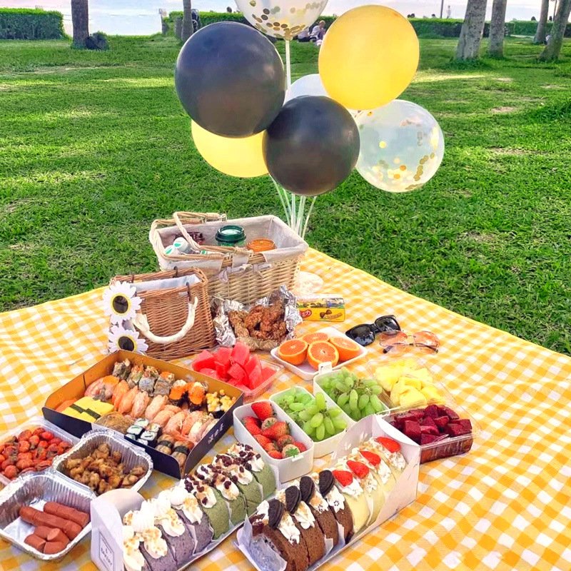 A one-time barbeque camper-proof-gauge-paint picnic idea with a barbeque in yellow and white on the lawn