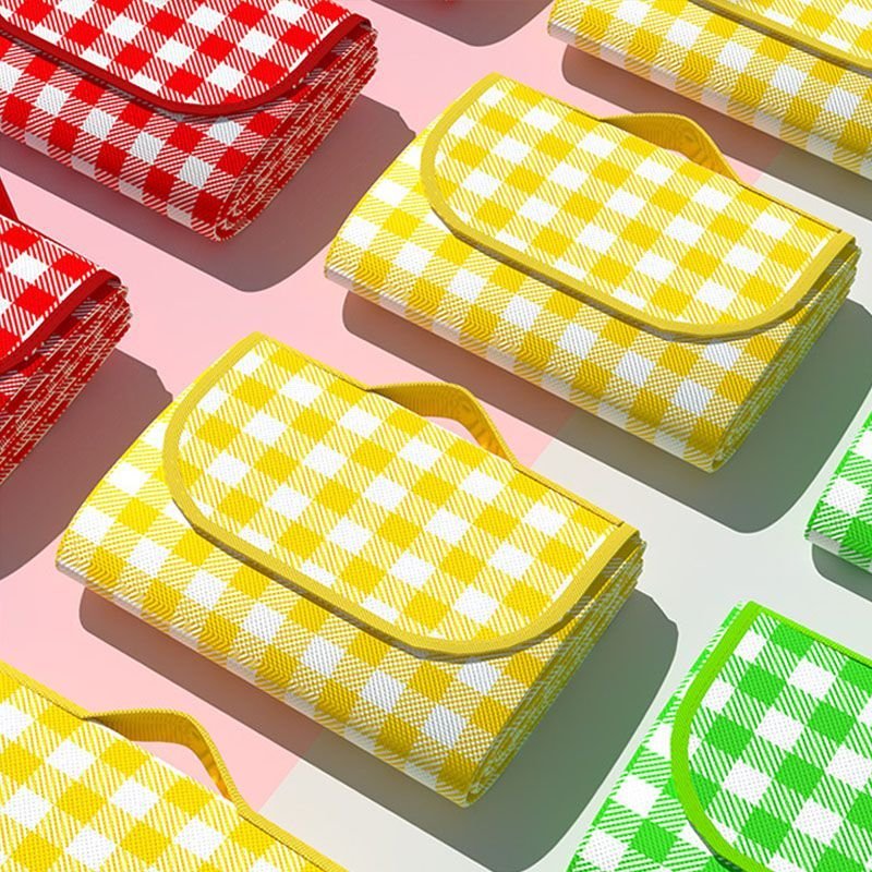A picnic pad with water and portable outdoors for a picnic
