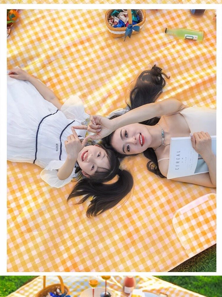 A picnic pad with a thick outdoor cooking camping tent