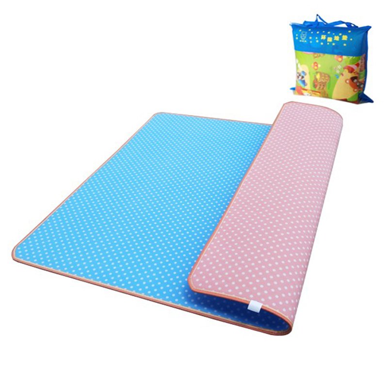 Happy Bear's Outside Blanket picnic mats are so big and so thick they're camping in a sandy field