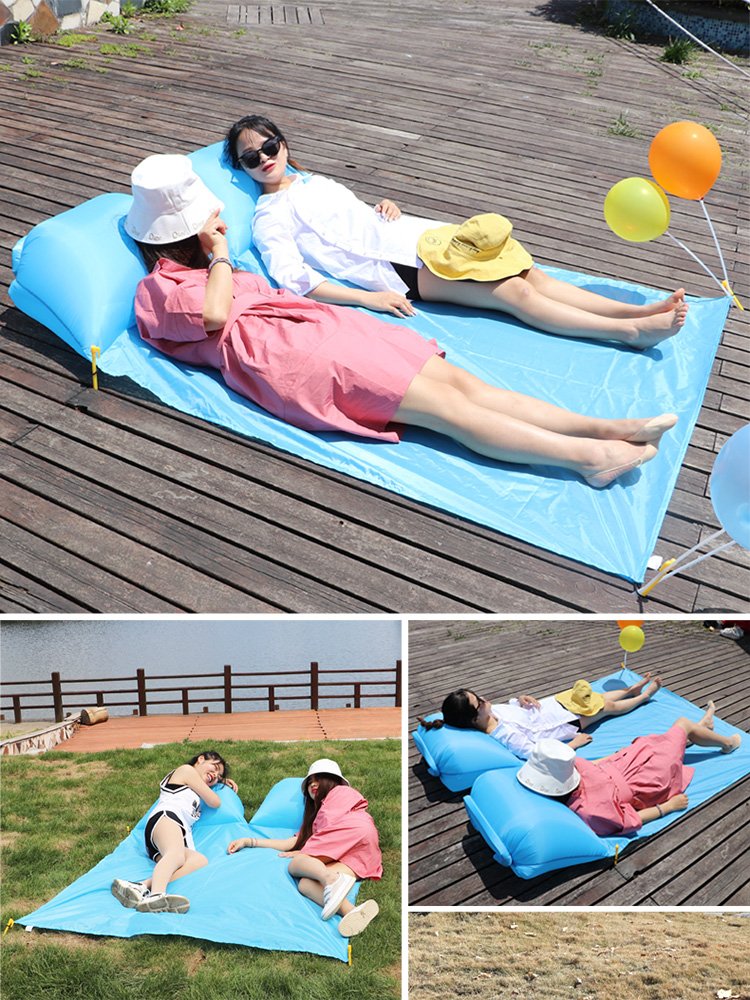 On the outdoors, on the peri-tidal grass, on the beach, the two of them carry an inflatable pillow