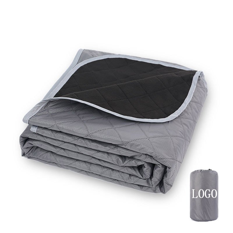 A picnic pad with a thick outdoor velvet and a camping blanket with a portable machine for blackwashing