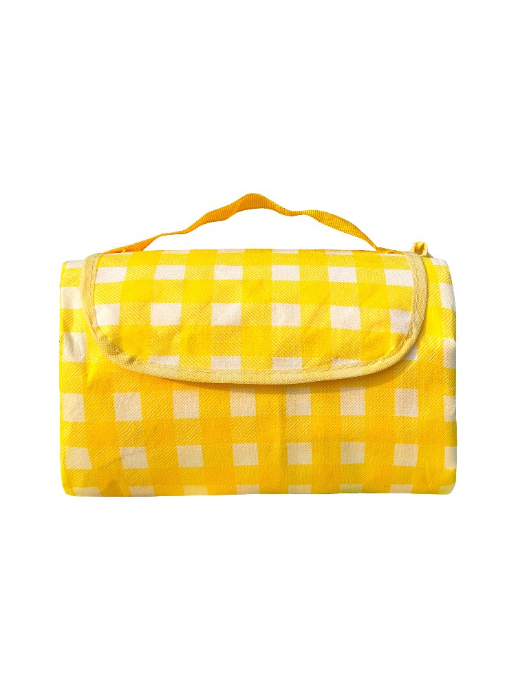 A picnic mat with water and a camper for outdoors